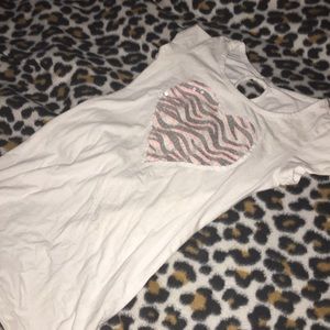 Heart shirt , dark jeans